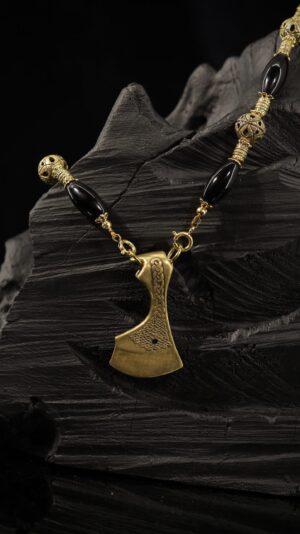 Black onyx necklace with a brass axe pendant — handmade jewelry by Frolov Jewels