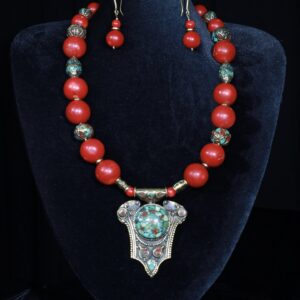 Coral necklace with Tibetan cloisonné beads and a vintage Tibetan pendant — handmade jewelry by Frolov Jewels