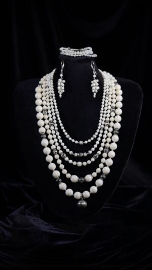 Five-strand necklace of round white corals — handmade jewelry by Frolov Jewels