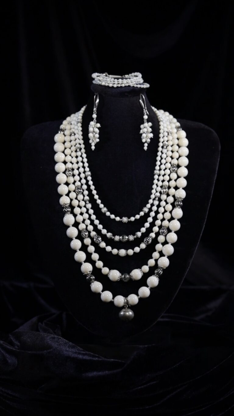 Five-strand necklace of round white corals — handmade jewelry by Frolov Jewels