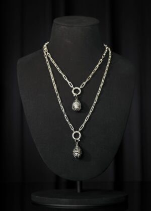 Rhodium-plated pysanka pendants on chains — handmade jewelry by Frolov Jewels