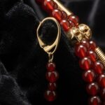 Three-strand carnelian necklace with 18K gold-plated brass zgardas, with earrings — handmade jewelry by Frolov Jewels (view 5)