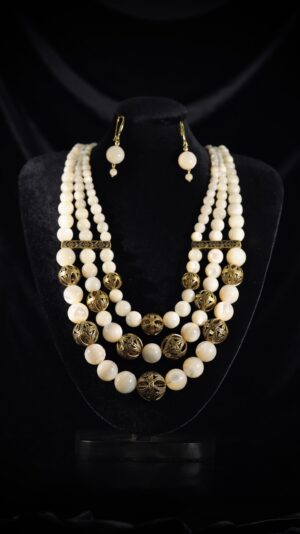 Three-strand mother-of-pearl necklace with brass beads — handmade jewelry by Frolov Jewels