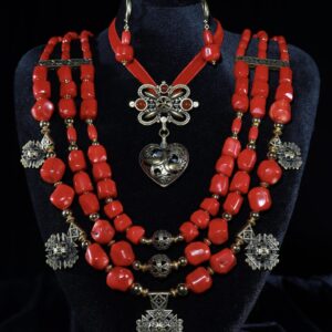 Three-strand red coral set with “Azhurni” openwork zgardas and a dukach medallion — handmade jewelry by Frolov Jewels