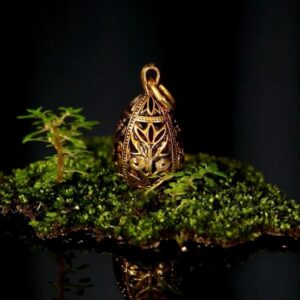 Gold-plated Kolokuli pysanka pendant — handmade jewelry by Frolov Jewels