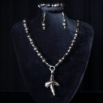 Single-strand black baroque pearl necklace with a pearl cross pendant — handmade jewelry by Frolov Jewels